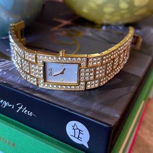 Dolce and Gabbana bracelet watch. C’est Chic Gold plate Swarski bracelet watch.